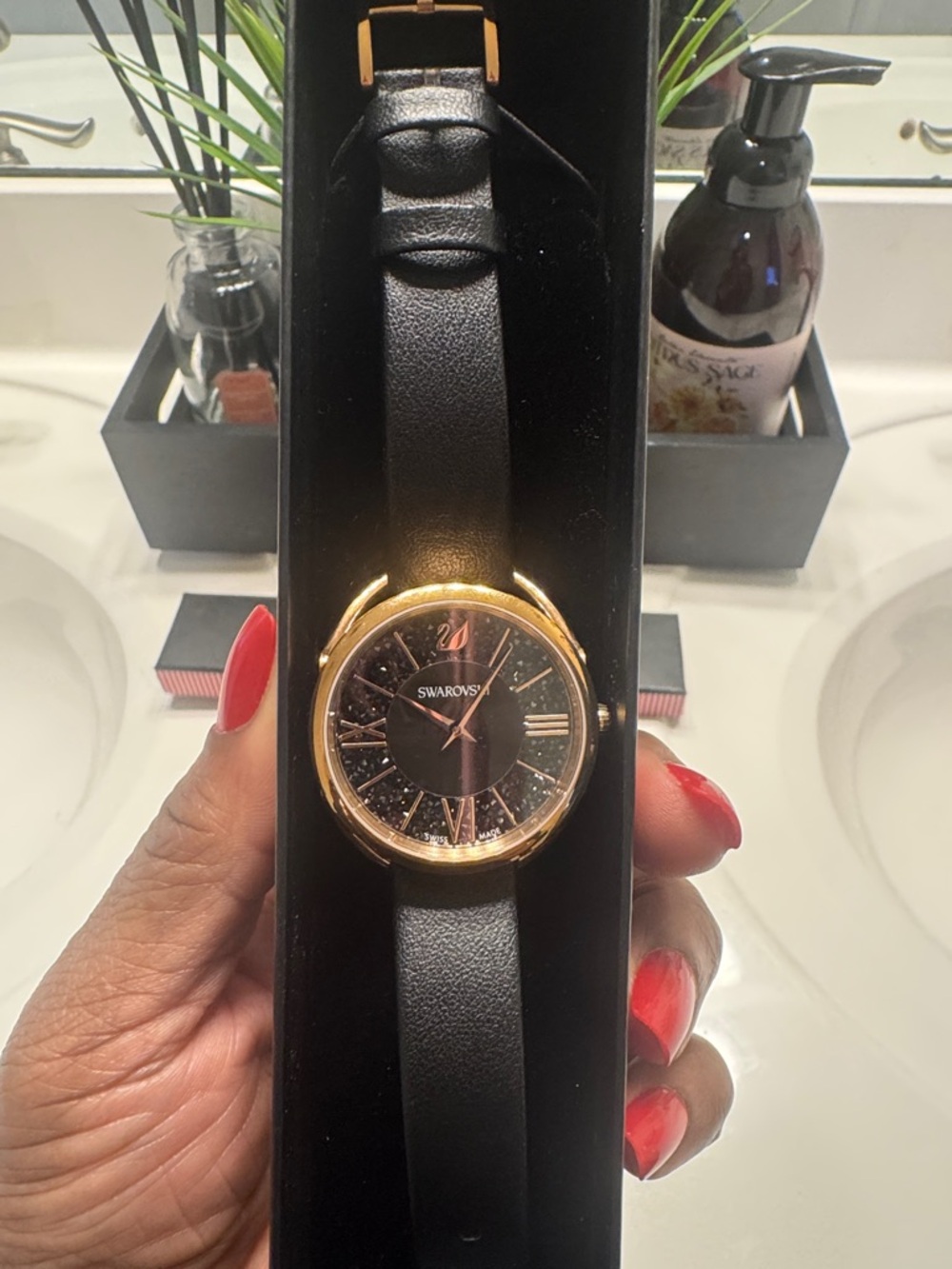 Swarovski Black Leather Strap Watch with Gold-Tone Crystal Bezel